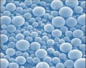Uma pequena microesfera termoplstica encapsulando um gs. Ao ser adicionado calor, o gs se expande enquanto a casca amolece, ocorrendo um grande aumento em seu volume.
